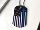 necklace with thin blue line cross embedded in a patriotic american flag